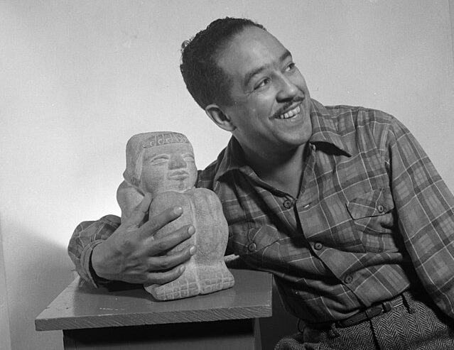 Poet Langston Hughes, photographed by Gordon Parks in 1943.