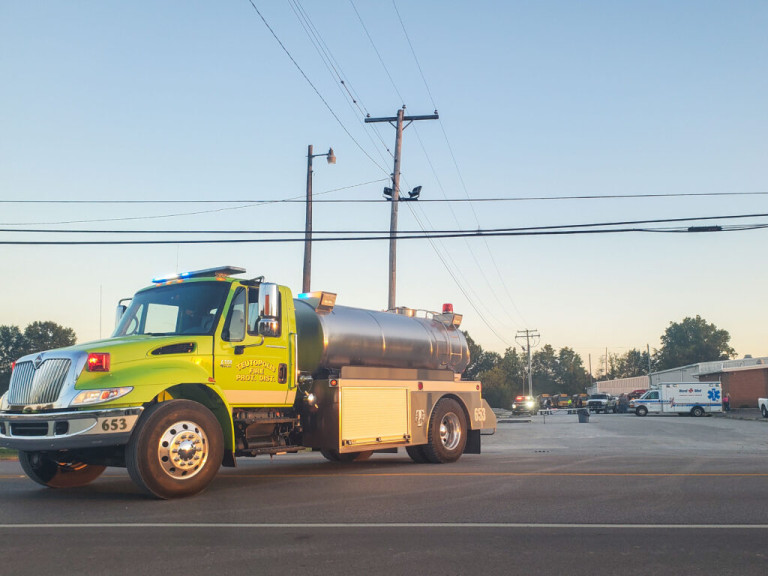 Fire Protection District truck blocks Main Street in Teutopolis, Ill. on Saturday, Sept. 30, to prevent traffic from entering the area still contaminated by the anhydrous ammonia that leaked as a result of the previous night's vehicle accident.