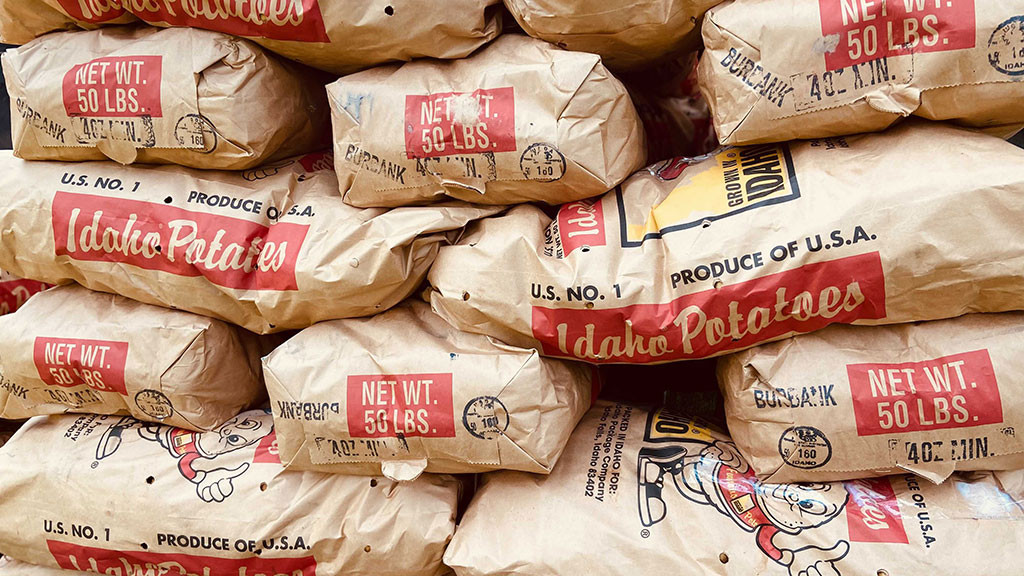 stack of bags of potatoes