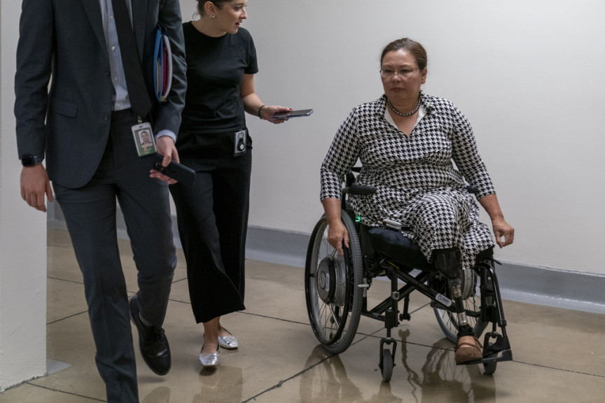Sen. Tammy Duckworth, D-Ill., heads to a vote on Capitol Hill, Wednesday, Sept. 6, 2023 in Washington.