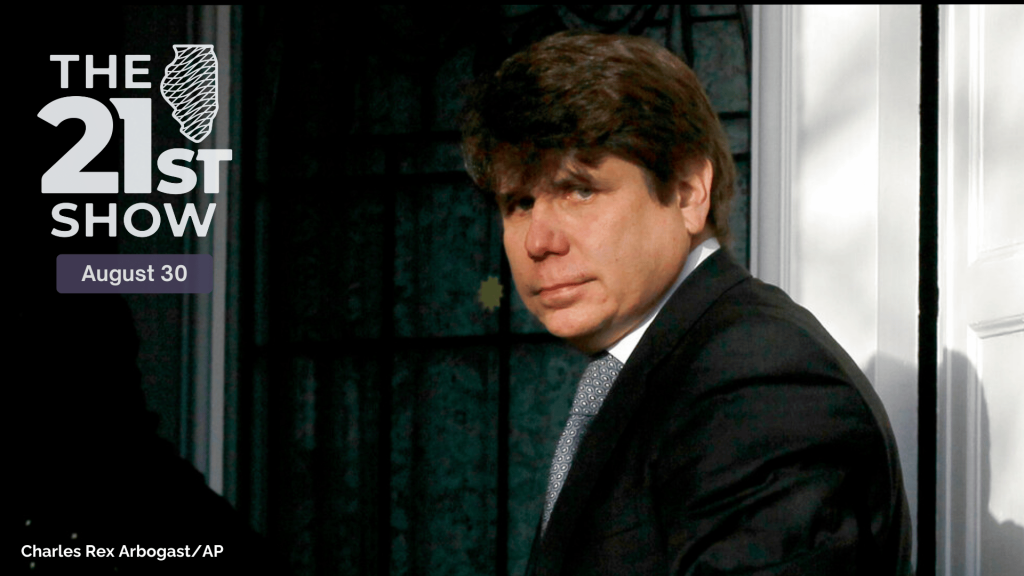 Rod Blagojevich, wearing a dark suit, looks back at the photographer as he enters his house