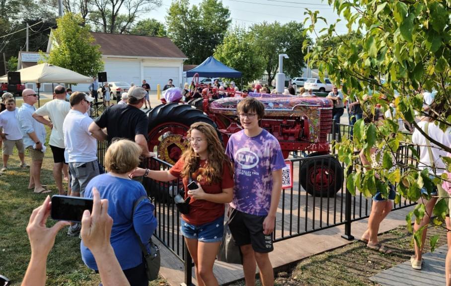 The unveiling ceremony for Tractor Town drew a crowd in Macomb on Saturday, September 11, 2021.