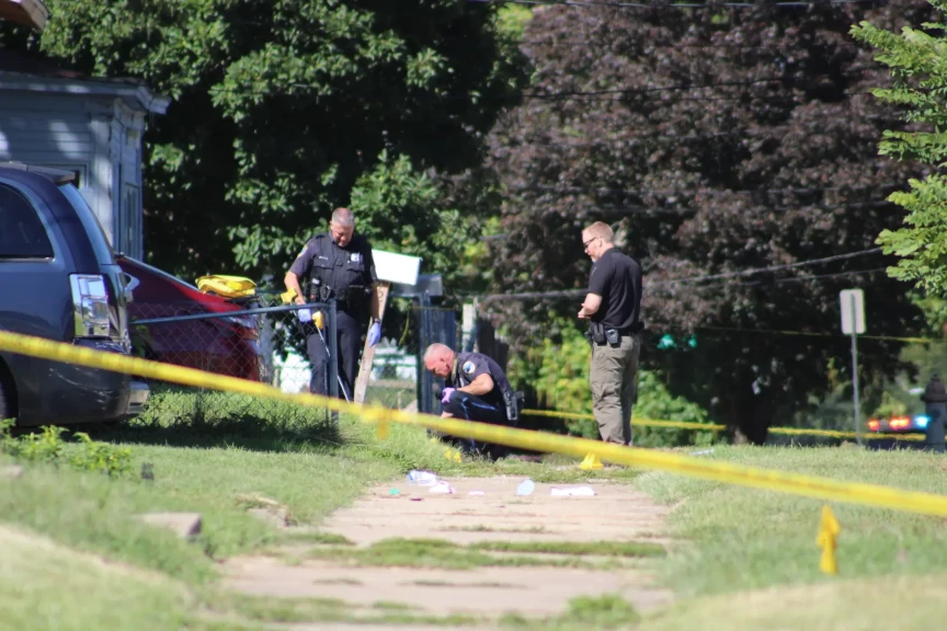 Officers from the Peoria Police Department work at the scene of a shooting on August 31, 2023.