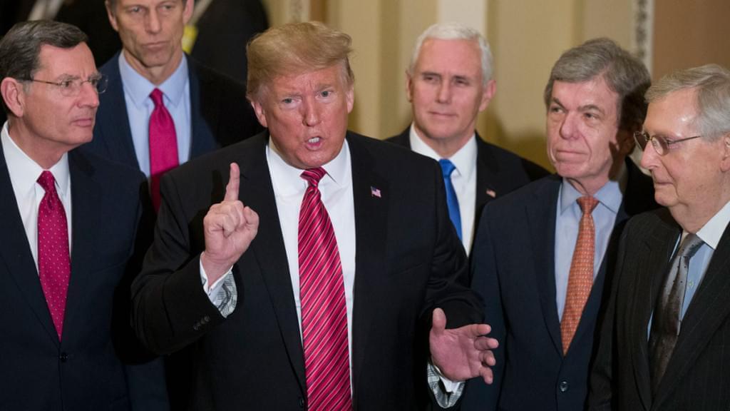 Sen. John Barrasso, R-Wyo., left, and Sen. John Thune, R-S.D., stand with President Donald Trump, Vice President Mike Pence, Sen. Roy Blunt, R-Mo., and Senate Majority Leader Mitch McConnell of Ky., as Trump speaks while departing after a Senate Republican Policy luncheon, on Capitol Hill in Washington. The Republican Party still belongs to Donald Trump. The GOP privately flirted with purging the norm-shattering former president after he incited a deadly riot at the U.S. Capitol last month. But in the end, only seven of 50 Senate Republicans voted to convict Trump in his historic second impeachment trial on Saturday, Feb. 13, 2021.