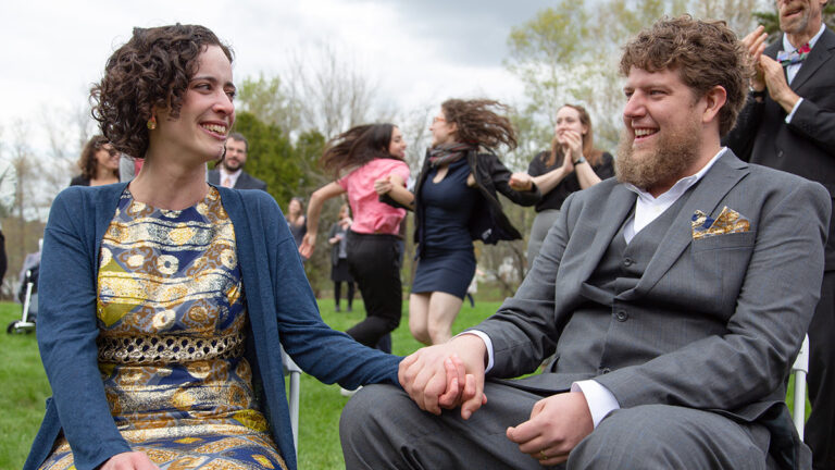 Liana Wolk (left) and Owen Marshall (right) at their wedding in May 2019. Marshall is one of an estimated 5 million Americans stuck in the 