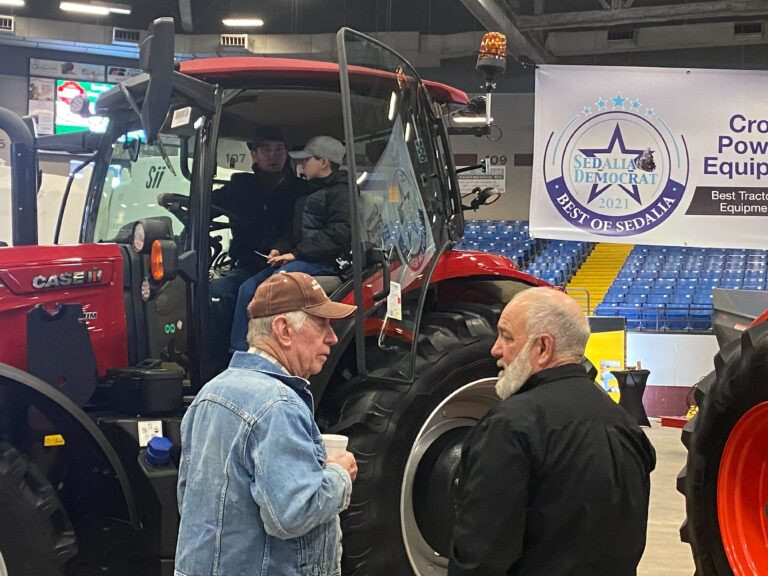 Farmers check out a new tractor at the Central Missouri Ag Club Ag Expo in Sedalia. The pandemic and changes in the agriculture business have created uncertainty in the future of farm shows.