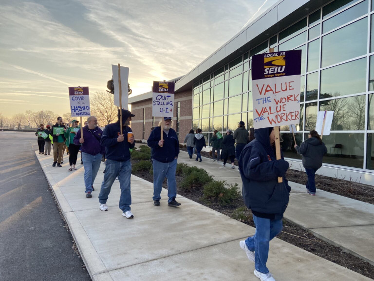 Union members at the University of Illinois picketed last spring as part of months-long fight for more pay. Even after SNAP-Ed workers received a raise as part of a new contract, some say they're still not making a living wage.