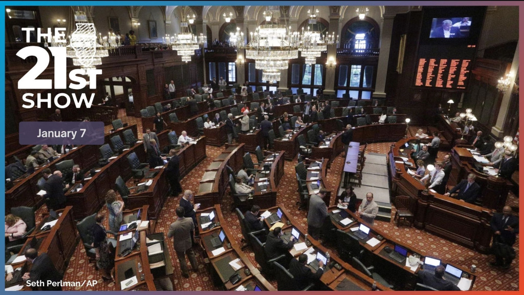 Photograph of Illinois lawmakers listen to debate on the House floor during a session at the Illinois State Capitol. 