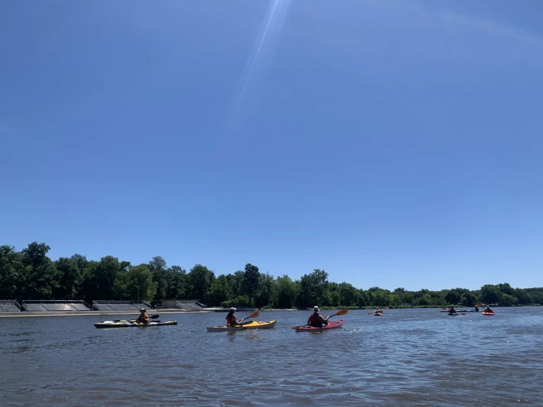 Teachers kayaking down the Rock River, just north of Rockford.