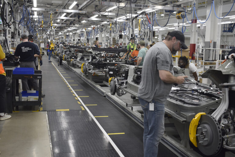 Due in part to supply chain issues, Rivian is only projecting to make 25,000 electric trucks, SUVs, and vans this year – inside a plant that theoretically can make 150,000 per year.