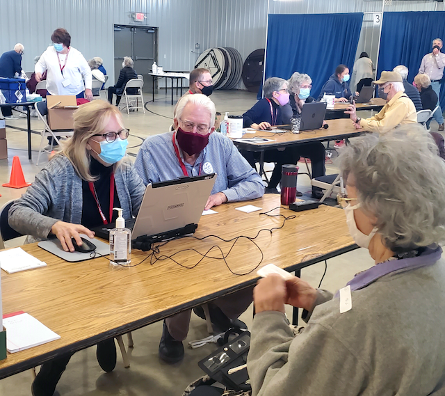  Libraries across Indiana are assisting in covid-19 vaccine assistance. Staff have been trained to answer questions and register residents. Staff at thehe Knox County Public Library assist at a local site.