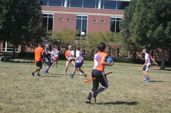 Quadball is made up of mixed-gender teams competing in a blend of rugby, dodgeball, and tag. A quadball team consists of seven players who must compete with a broom between their legs at all times.