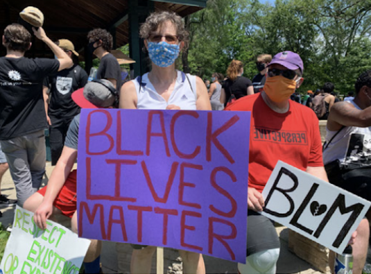 Black Lives Matter protesters at a June 2020 rally in Champaign.