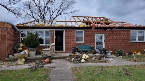 Damaged farmhouse in North Okaw Township, Coles County following storms on December 10, 2021.