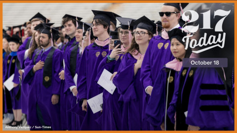 Students stand for the national anthem at the commencement ceremony at Ryan Field Stadium at Northwestern University in 2023. Data from Northwestern shows little demographic change in the first freshman class admitted after the Supreme Court banned the use of race in admission decisions.