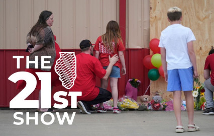 People leave balloons at the scene where a car barreled through a building used for an after-school camp Tuesday, April 29, 2025, in Chatham.