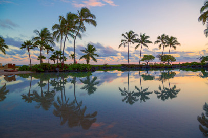 Glenfinnan Monument on Loch Shiellverness surrounded by green hills