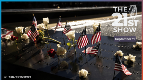 Flowers are placed on the south pool during the 9/11 Memorial ceremony on the 23rd anniversary of the Sept. 11, 2001 attacks, Wednesday, Sept. 11, 2024, in New York.