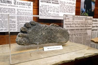 This Aug. 8, 2019, photo shows a plaster cast of footprints believed to be made by a Bigfoot on display at Expedition: Bigfoot! The Sasquatch Museum in Cherry Log, Ga. The owner of this intriguing piece of Americana at the southern edge of the Appalachians is David Bakara, a longtime member of the Bigfoot Field Researchers Organization who served in the Navy, drove long-haul trucks and tended bar before opening the museum in early 2016 with his wife, Malinda.