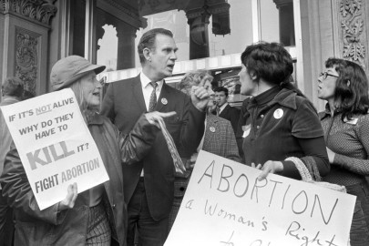Anti-abortion and abortion-rights activists argue their viewpoints on the steps of the State House in Trenton, N.J., April 30, 1973. 