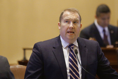 Illinois state Sen. Scott Bennett, D-Champaign, speaks to lawmakers while on the Senate floor during session at the Illinois state Capitol on May 4, 2016, in Springfield, Ill. Bennett, a key legislative negotiator on clarifying the landmark SAFE-T Act criminal justice overhaul that takes effect Jan. 1, 2023, died Friday, Dec. 9, 2022. He was 45.