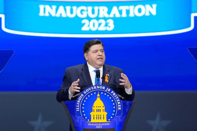 Illinois Gov. J.B. Pritzker waves to crowd after delivering his inaugural address during ceremonies Monday, Jan. 9, 2023, in Springfield, Ill. 
