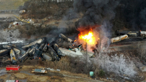 This photo taken with a drone shows portions of a Norfolk and Southern freight train that derailed on Feb. 3, 2023 in East Palestine, Ohio are still on fire at mid-day Saturday, Feb. 4.