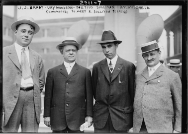 four men standing together in 1913
