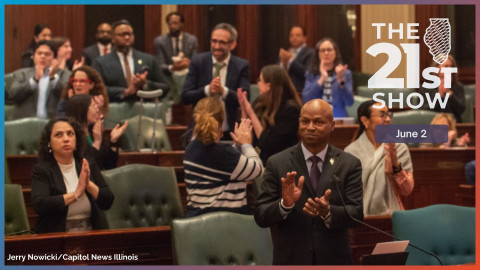 House Speaker Emanuel “Chris” Welch and members of his Democratic caucus applaud members of their staff early Sunday morning after the chamber approved the $55.2 billion budget bill.