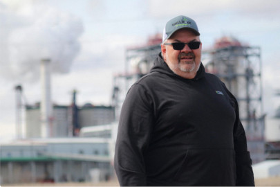 Jeff Reints stands near an ethanol plant in Shell Rock, Iowa, near his farm. While most of his corn goes to the POET Bioprocessing ethanol plant, he's opposed to a pipeline that would carry CO2 away from the plant and under his fields. "It is a little awkward," Reints said of supporting ethanol while opposing the pipelines. "But you have to stand for something."