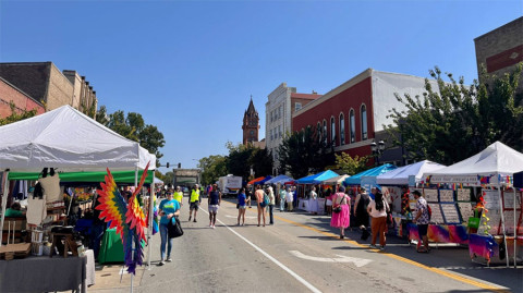 Vendor tents set up for the 2023 pride parade in Urbana on September 30, 2023.