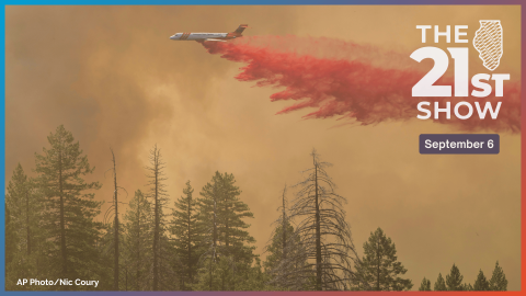 A plane drops fire retardant on the Park Fire near Forest Ranch, Calif., Sunday, July 28, 2024.