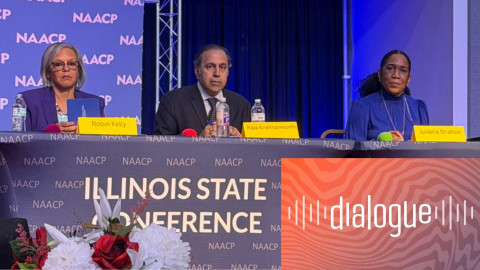 three people sitting at a table