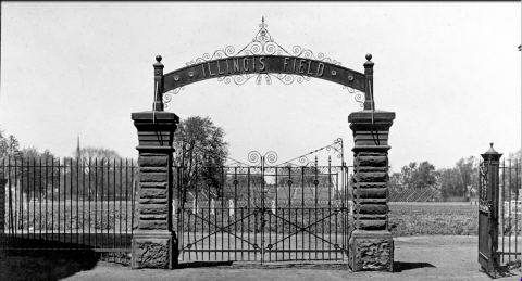 stone and metal arch entrance to Illinois Field