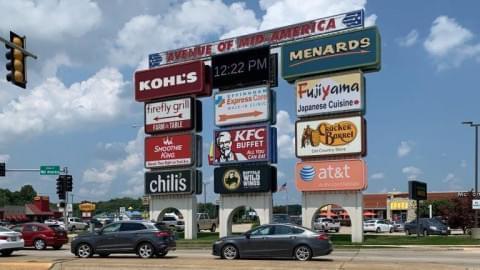 Effingham, located in Illinois' 15th Congressional District, is a hub for both travelers and commercial freight traffic. Here, a cluster of signs in Effingham advertise restaurant and shopping options.