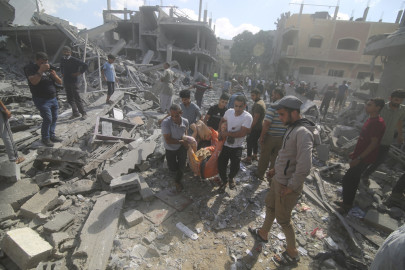 Palestinians evacuate wounded in Israeli bombardment of Rafah, southern Gaza Strip, Tuesday, Oct. 17, 2023.