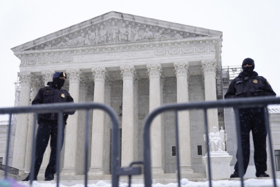 Two U.S Capitol police officers stand guard outside of the Supreme Court during March for Life on Friday, Jan. 19, 2024, in Washington.