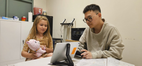An IKIDS researcher at UIUC conducts a part of the study with a child participant. IKIDS aims to understand how exposures to chemicals in consumer products can affect children’s physical development and neurodevelopment.
