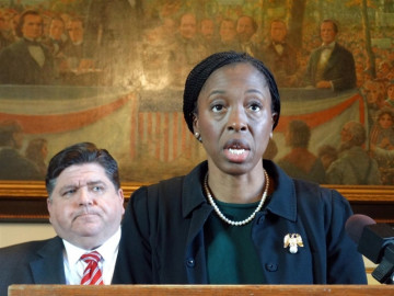 Dr. Ngozi Ezike appears in a 2020 photo with Gov. J.B. Pritzker in his office in Springfield. She was appointed Illinois Department of Public Health director in 2019.