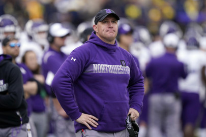 Northwestern head coach Pat Fitzgerald stands on the sideline during the first half of an NCAA college football game against Michigan, Oct. 23, 2021, in Ann Arbor, Mich. Northwestern has fired Fitzgerald Monday, July 10, 2023, amid a hazing scandal that called into question his leadership of the program and damaged the university's reputation after it mishandled its response to the allegations. 