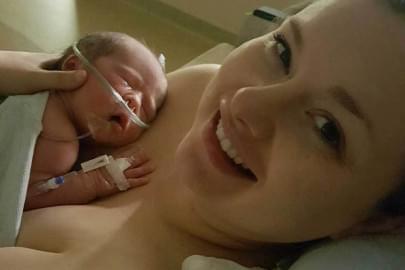  Paige Raab holds her baby in the neonatal intensive care unit. Her experience with two traumatic births and NICU stays led her to create the new nonprofit group, "The Nest Postpartum."