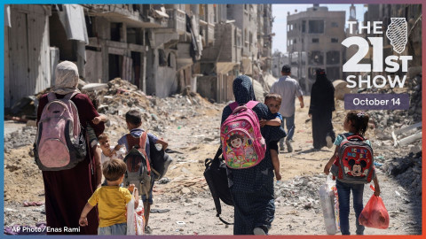 Palestinian women and their children walk though destruction in the wake of an Israeli air and ground offensive in Jebaliya, northern Gaza Strip after Israeli forces withdrew from the area, on May 31, 2024.