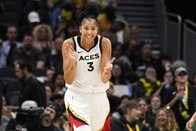  Las Vegas Aces forward Candace Parker (3) reacts during the first half of a WNBA basketball game against the Seattle Storm, Saturday, May 20, 2023, in Seattle. Parker plans on playing another season if she's healthy enough to do so. The two-time WNBA MVP missed the Las Vegas Aces run to a second straight league championship after having surgery on her left foot in late July. 