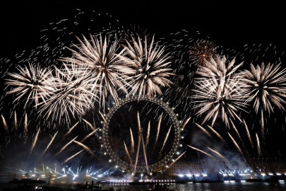 Fireworks light-up the sky over the London Eye in central London to celebrate the New Year on Monday, Jan. 1, 2024.