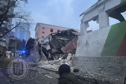 In this photo provided by the Kyiv Regional Military Administration, debris of a destroyed apartment building is seen after a Russian attack in Kyiv, Ukraine, Tuesday, Jan. 23, 2024.