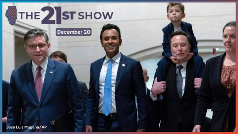 Speaker of the House Mike Johnson, from left, walks with Vivek Ramaswamy and Elon Musk, who is carrying his son X Æ A-Xii, as they walk to a meeting on Capitol Hill in this file photo from Dec. 5, 2024.