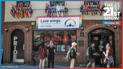 Pride flags on the Stonewall Inn bar in New York City. As the site of a riot following a police raid in 1969, it's arguably the most prominent LGBTQ space in America. It's seen here in a file photo from June 3, 2019.