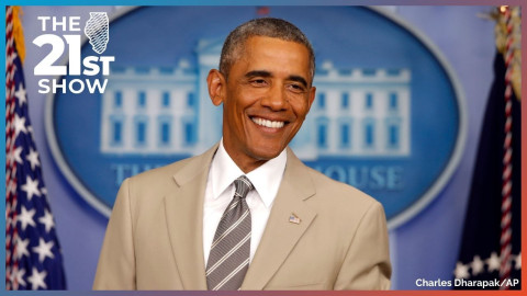 FILE - In this Thursday, Aug. 28, 2014 file photo, President Barack Obama smiles as he takes questions about the economy, Iraq, and Ukraine, in the James Brady Press Briefing Room of the White House in Washington, before convening a meeting with his national security team on the militant threat in Syria and Iraq. Obama's summer fashion choice, not unprecedented among presidents - himself included - was the talk of social media, Thursday. Other presidents who have taken on tan include Bill Clinton, Ronald Reagan, George H. W. Bush, George W. Bush and Dwight Eisenhower.