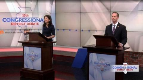 Democratic candidate Betsy Dirksen Londrigan (left) and Republican incumbent Rodney Davis, deliver opening statements during their broadcast debate in Champaign Monday evening.