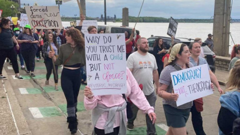 Hundreds of abortion rights protesters marched in downtown Louisville on May 4, 2022.